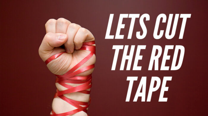 A hand wrapped in red tape