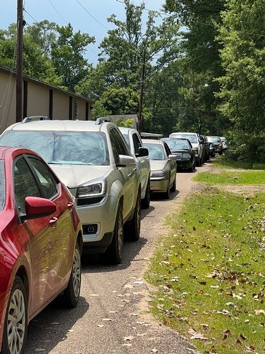 Cars lined up to get relief from the high cost of gas in 2022. AFP-Mississippi was offering discounted gas at a local Chevron station in Forest, Mississippi. 